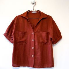 Elevate Your Wardrobe With This Wishlist Apparel Rust Burnt Orange Button-Up Blouse! Crafted From 100% Polyester, This Blouse Combines Style And Comfort Seamlessly. Its Short Sleeves And Button-Up Design Add A Touch Of Sophistication To Any Ensemble. Designed In A Size Small, It Offers A Flattering Fit For All-Day Wear. Hand Wash Cold And Lay Flat To Dry To Maintain Its Pristine Condition. Never Worn And In Like-New Condition, This Blouse Is Ready To Become A Staple In Your Closet. Don't Miss Th Business Casual Blouses For Women, Burnt Orange Clothes, 70s Button Up Shirt, Short Sleeve Tops For Women, Japanese Winter, Marc Spector, Floral Silk Shirt, Business Casual Blouse, Mom Vibes