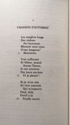 an open book with black writing on it's pages and the words written in french