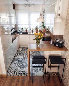 the kitchen is clean and ready to be used as a dining room or living area