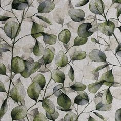 a green and white fabric with leaves on the back ground, all in shades of grey