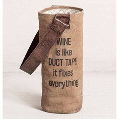 a wine bag that has some type of label on it, with the words wine is like duct tape it fixes everything