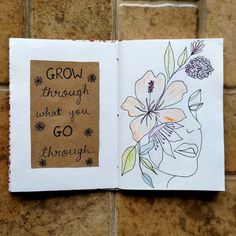 an open book with flowers on it and the words grow through what you go through