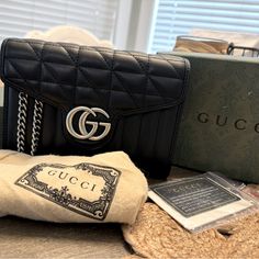 Black Matelass Leather Antique Silver-Toned Hardware Viscose Lining Double G 16 Card Slots And Two Bill Compartments Three Separate Interior Compartments Zip Coin Pocket Removable Chain Shoulder Strap With 24" Snap Closure 8"W X 5"H X 2.5"D Made In Italy Retails $1800 On Gucci Questions? Leave A Comment Below! Gucci Marmont Mini Bag, Gucci Marmont Mini, Gucci Marmont, Wallet On Chain, Gucci Bag, Snap Closure, Mini Bag, Card Slots, Antique Silver