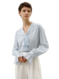 The palace pleat design on the cuffs adds an extra element of sophistication, creating an atmosphere of refined elegance. Whether it's for work or casual outings, this blouse is versatile and suitable for any occasion. 23MM Ghost Crepe V-neck Neckline ribbon Pleated cuffs Suitable for casual work and vacations Ribbon Blouse, Womens Active Wear Outfits, Silk Nightwear, Blouse Nordstrom, Active Wear Outfits, Crepe Fabric, Womens Activewear, Silk Top, Work Casual