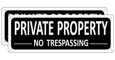 a black and white sign that says private property no trespassing on the front