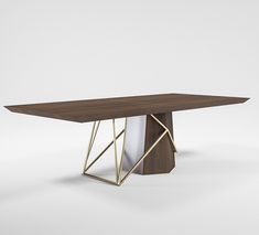 a wooden table with metal legs and a white cloth on it's end, in front of a gray background