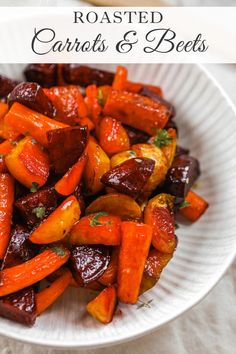 roasted carrots and beets in a white bowl