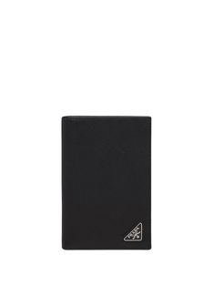 Black calf leather Saffiano triangle logo passport cover from PRADA featuring enamel triangle logo, internal slip pocket, internal card slots and silver-tone hardware. Aesthetic Gifting, Prada Brand, Leather Passport Holder, Passport Case, Prada Saffiano, Black Luxury, Passport Wallet, Triangle Logo, Passport Cover