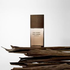 L'Eau d'Issey pour Homme Wood & Wood by Issey Miyake is a Woody fragrance for men. This is a new fragrance. L'Eau d'Issey pour Homme Wood & Wood was launched in 2019. Top notes are grapefruit, cardamom and elemi; middle notes are ambroxan, apricot, sandalwood and virginian cedar; base notes are haitian vetiver, patchouli and woody notes. Issey Miyake Men, Perfume Photography, Perfume Packaging, Cosmetics Photography, Moisturizing Body Lotion, Prop Styling, Woody Notes, Woody Fragrance