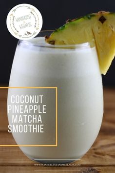 a glass filled with coconut pineapple matcha smoothie