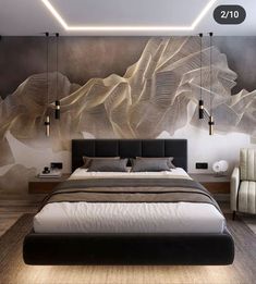 a large bed sitting in a bedroom next to a painting on the wall above it