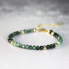 "This genuine Emerald Bracelet for Women is striking, sparkling, and colourful. Stylish and minimal worn alone, but great to mix, match & stack. Emerald makes a perfect gift for mom, whether for a birthday, Mother's day, or just to say 'thank you' or 'I love you\". Choose from the very dainty, 'skinny' bracelet for a delicate, feminine, minimal look - made with 2.5mm tiny sparkling Emeralds. Or the beautiful, larger 'standard' bead size bracelet for a little more weight and substance - made with Elegant Green Round Beads Friendship Bracelets, Elegant Faceted Bead Friendship Bracelet, Elegant Gemstone Beaded Bracelets For Friendship, Elegant Green Beaded Bracelets For Friendship, Green Bangle Bracelet With Faceted Beads, Green Faceted Beads Bangle Bracelet, Green Rondelle Bracelets For Jewelry Making, Green Faceted Round Bead Bracelets, Green Faceted Bracelets