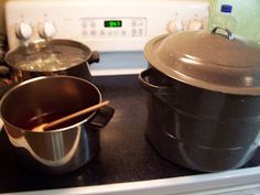 pots and pans are sitting on the stove