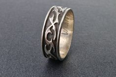 Vintage ring made of 925 sterling silver with a black ornament. The ring is a solid strip.  Ring size 8, inner diameter 18 mm.  The width of the ring at the top is 7 mm.  The weight of the ring is 4.1 gr.  The condition is excellent.  The ring can be female and male. Vintage and antique items sold as-is. This is a unique thing from the last century. It can be a wonderful gift for a special person or for yourself.  It will also be a great addition to your collection.  If you love vintage items, p Minimalist Silver Ring, Solid & Striped, Unique Things, Vintage Ring, Special Person, Stackable Rings, Antique Items, Sterling Silver Ring, Vintage Rings