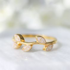 The Eden Breastmilk Ring by Milk Couture Co. Breastmilk Ring With Birthstone, Milk Jewelry, Elegant Open Ring With Birth Flower, Nature-inspired Gold Jewelry For Promise, Nature-inspired Stackable Rings For Gifts, Nature-inspired Open Ring For Anniversary, Nature-inspired White Gold Promise Jewelry, White Gold Nature-inspired Jewelry For Promise, Handmade Nature-inspired Yellow Gold Rings