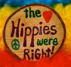 the hippies were right hand painted on a piece of wood that says,'the hippies were right '