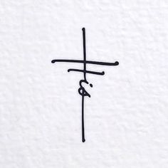 an image of a cross with the word jesus on it in black and white ink