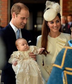 the duke and his wife are holding their baby