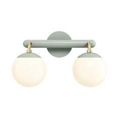 two lights are hanging on the wall in front of a white background and one light is off