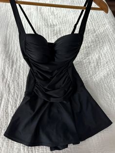 Venus St. Tropez Swim Dress Black Size 8 This elegant swim dress is ready for its moment in the sun, and it's deserving considering how unbelievably flattering it is. Its little secret: a control lining that offers mid-level shaping support. With a sweetheart neckline, ruched middle and feminine skirt that provides flirty coverage, this one-piece will easily become your new fave. Control lining Adjustable straps Molded cups Full coverage skirt Domestic or import of quality nylon/spandex tricot Only worn a few times, in lovely condition with no tears or pulls. From a smoke free home and washed in delicate detergent and ready to wear :) This item is still for sale on the Venus web site for $59.90 with out tax or shipping costs. I love it but it a little to tight in the top for me. I do have Feminine Skirt, St Tropez, Swim Dress, Women Swimsuits, Sweetheart Neckline, Dress Black, Bathing Suits, Adjustable Straps, Ready To Wear