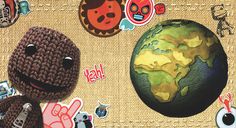 there is a small stuffed animal next to an earth with many stickers on it