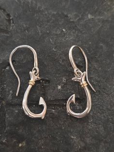 These earrings are beautiful and delicate. Made of solid sterling silver with 14kt vermiel accents and makes a great gift for anyone that loves fishing or into that lifestyle. Key West Fl, Fish Hook Earrings, Earrings Sterling Silver, Key West, Fish Hook, Hook Earrings, Sterling Earrings, Sterling Silver Earrings, Jewelry Earrings Dangle