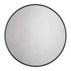 a round mirror with black trim around it