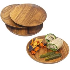 three wooden plates with different types of food on them