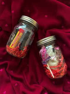 two mason jars filled with different types of items