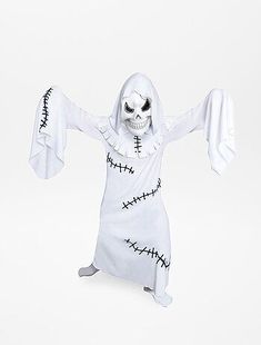 a person in a white costume with a skeleton on it's head and arms