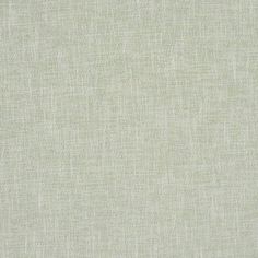 a plain light green fabric background