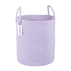 the lavender laundry basket has a white tag on it