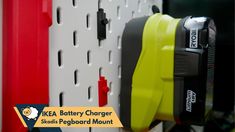 there is a yellow and black battery charger on the wall