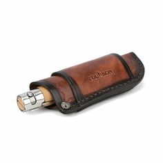 a leather case with a lighter in it