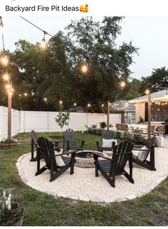 backyard fire pit with chairs and lights around it