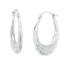 If simple elegance is the look she's hoping to achieve, these glistening hoop earrings are the perfect choice. Crafted in cool 10K white gold, each hoop is engraved with a wheat filigree pattern that glints and sparkles. Polished to a bright shine, these earrings secure with latch backs. Filigree Pattern, Simple Elegance, Earring Backs, White Metal, Designer Earrings, Fashion Earrings, Types Of Metal, Wheat, Gold Metal