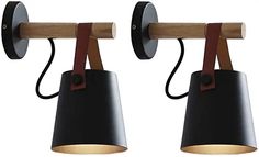 two black lamps with wooden arms on white background