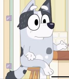 a cartoon dog sitting on top of a wooden stool in front of a kitchen counter