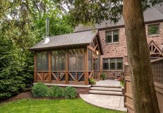 a house with a deck and steps leading up to it