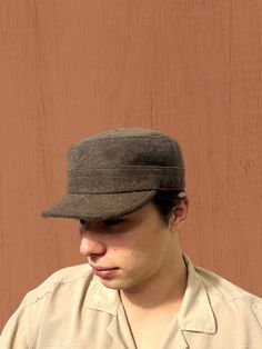 Elevate your winter outdoor style with our Brown Winter Cadet Cap, a versatile and adjustable hat inspired by military and duty ranger aesthetics. Crafted with care, this unisex brown cap seamlessly combines fashion with functionality, making it the ideal accessory for hiking, hunting, and outdoor adventures. Discover The Versatility Of Our Hat: -Classic fidel castro hat design with a modern twist -Wool construction for warmth and durability -Adjustable sun hat suitable for various head sizes -Military-style hat with a duty ranger vibe -Perfect brown soldier cap for winter expeditions -Camper hat for outdoor enthusiasts -Versatile and stylish winter hat for men and women Discover the rugged charm of our duty ranger hat, designed for those who appreciate military-inspired fashion. The deep Military Style Baseball Cap With Short Brim, Winter Outdoor Hats With Short Brim, Outdoor Flat Cap, Military Style Hunting Hat With Curved Brim, Curved Brim Military Hat For Hunting, Military Hunting Hat With Curved Brim, Brown Military Hat, One Size Fits Most, Khaki Winter Hats, One Size Fits Most, Khaki Winter Hat One Size Fits Most