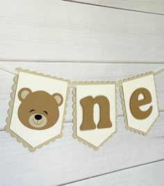 a teddy bear banner with the word me on it