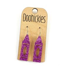 Add a playful touch to your back-to-school style with our 1.5" Glitter Crayon Acrylic Dangles! These quirky earrings are perfect for teachers, celebrating the fun of learning. They're sure to make a statement and spark conversation in the... Polymer Clay Crayon Earrings, Cute Teacher Earrings, Crayon Earrings, Whimsical Purple Nickel-free Earrings, Swim Jewelry, Teacher Earrings, Rachel Clark, Quirky Earrings, School Style