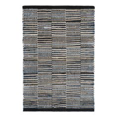 an area rug with blue and beige stripes on the bottom, black trim around the edges