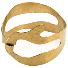 Gold-plated brass and hand-hammered Bracelet by Jacques Jarrige. Jarrige's jewelry is more companion than ornament, heightening one's physical awareness and bestowing the pleasure of inhabiting a well-built structure — a structure so light that it doesn't weigh on the body while delivering the theatricality of Jarrige's fluid gestures, translated into common yet gorgeously crafted metals. Their intentional lack of preciousness allows for a sense of spontaneous playfulness. Mid Century Modern Jewelry, Plate Jewelry, Hammered Bracelet, Contemporary Jewelry Design, Brass Plate, Hammered Gold, Contemporary Jewellery, Gorgeous Jewelry, Stunning Jewellery