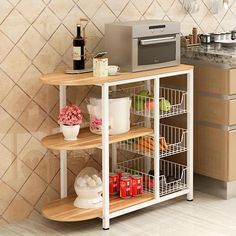 a microwave oven sitting on top of a wooden shelf next to a counter with food