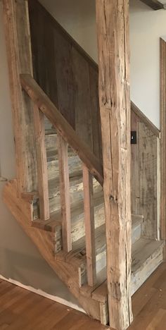 an old wooden stair case in a house