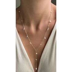 This lariat necklace has it all! Mini seed pearls in asymmetric clusters adorning a sparkly gold filled dainty yet durable chain, featuring an elegant pearl drop. This necklace elevates any outfit or occasion, from feeling like a mermaid on the beach to your adorning you on your wedding day. Please note that each pearl will vary slightly in shape as they are all natural, this is where the unique charm of each necklace shines! Both of our 16" and 18" length options include a 2" extender. 2mm seed Lariat Pearl Necklace, Pearl Cluster Necklace, Pearl Necklace Gold, Pearl Lariat Necklace, Pearl Lariat, Pearl Drop Necklace, Necklace Bridal, Pearl Cluster, Cluster Necklace