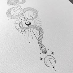 an ink drawing of a snake and moon with stars in the sky on white paper