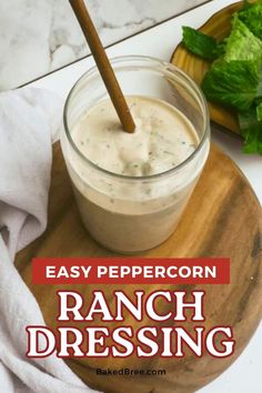 ranch dressing in a glass jar with a wooden spoon