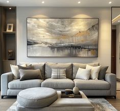 a living room filled with furniture and a large painting on the wall